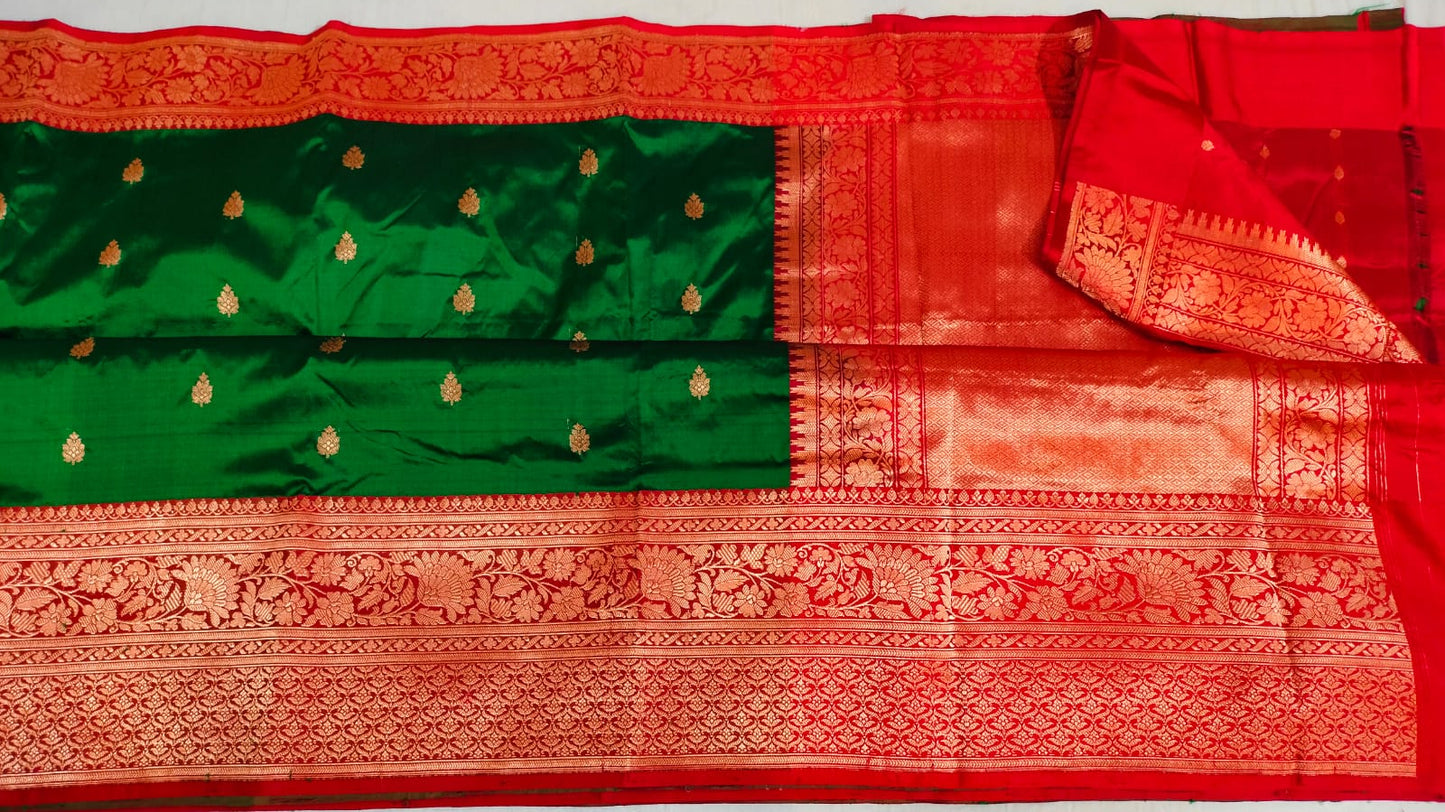 Beautiful katan Banaras Kaduva butta saree in green with red Christmas colours