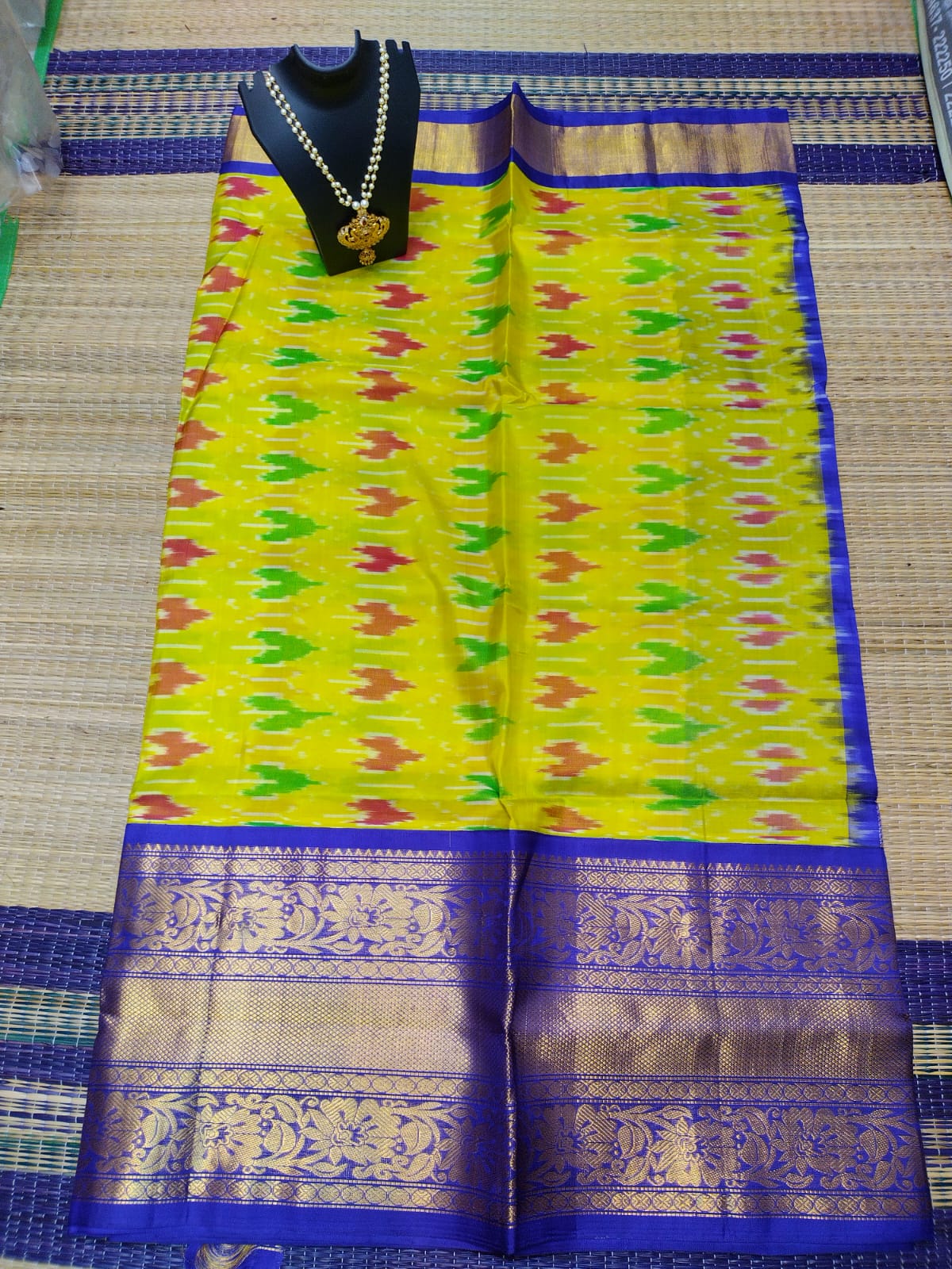 Kanjivaram softsilk saree in yellow pochampalli double warp with silver jari