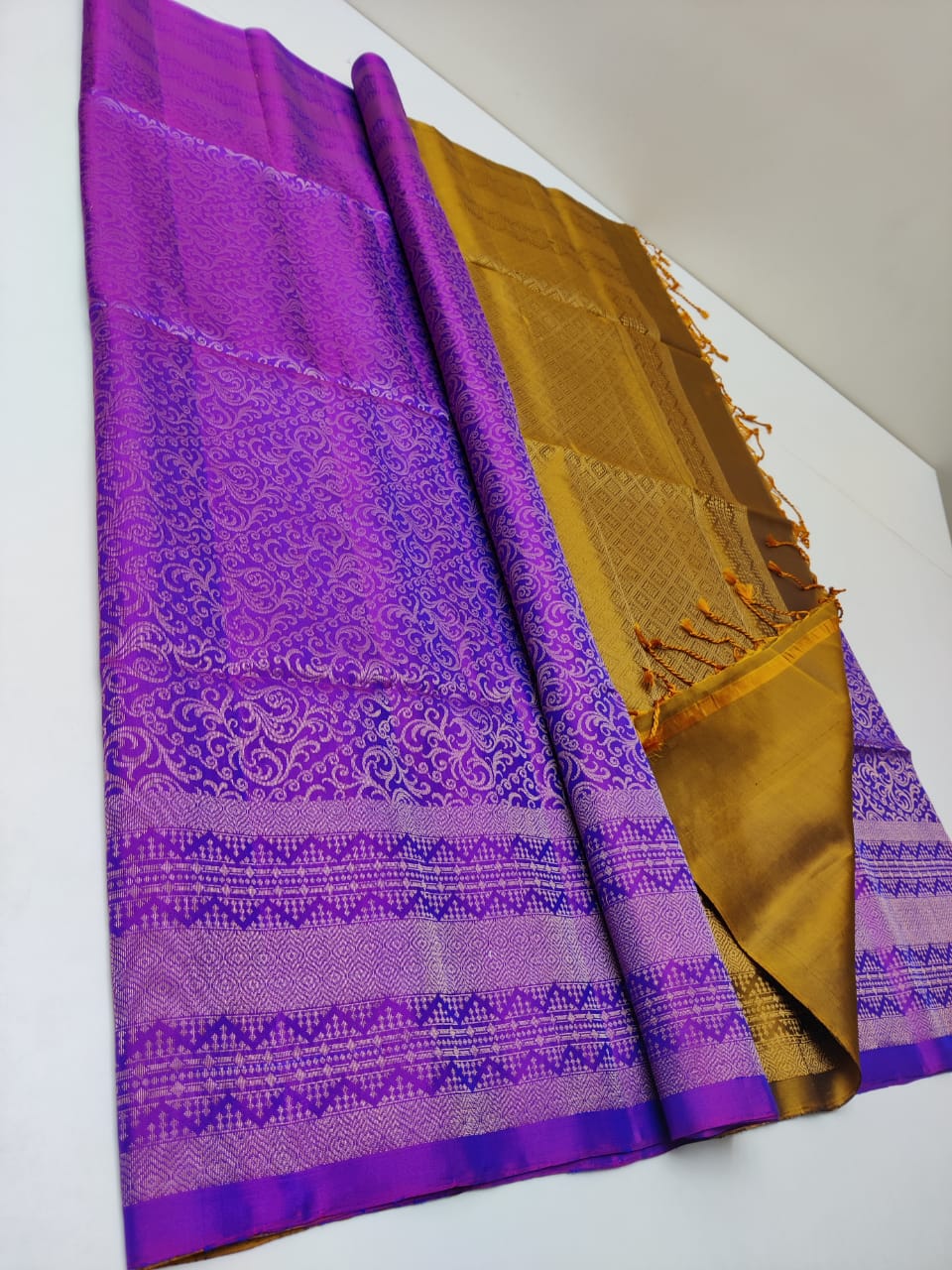 Pure Kanjivaram silk saree in handoven fully Jari weaving in purple color with golden pallu