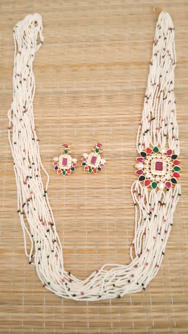 Jewellery white Crystal beads in Layers with navaratna style pendant and earrings necklace with earrings