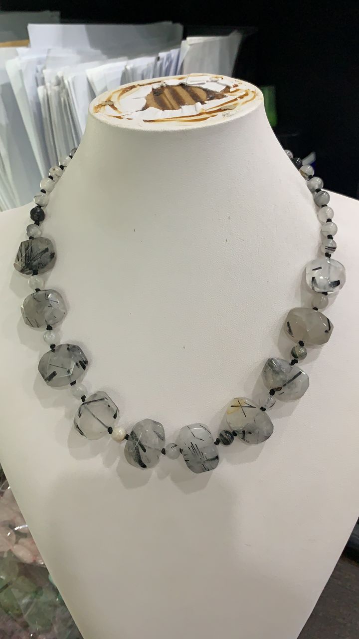 Jewellery Natural Stone Beads jewelry in big beads in oval shape with cuts transparent background with black