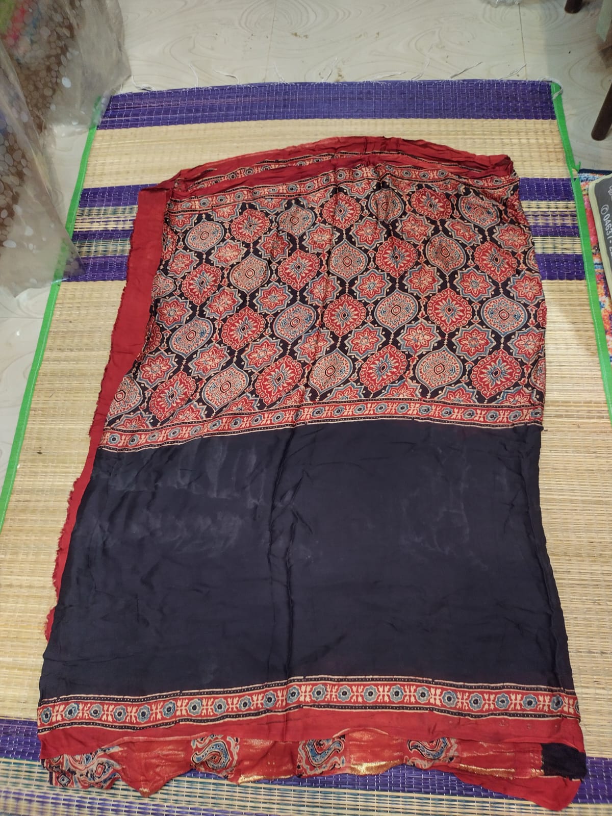 Ajrakh saree in modal silk with black color with maroon illusion