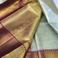 Handloom pure kanjivaram silk saree  bridal silk golden color with tissue all over pure golden jari all over green with maroon border 