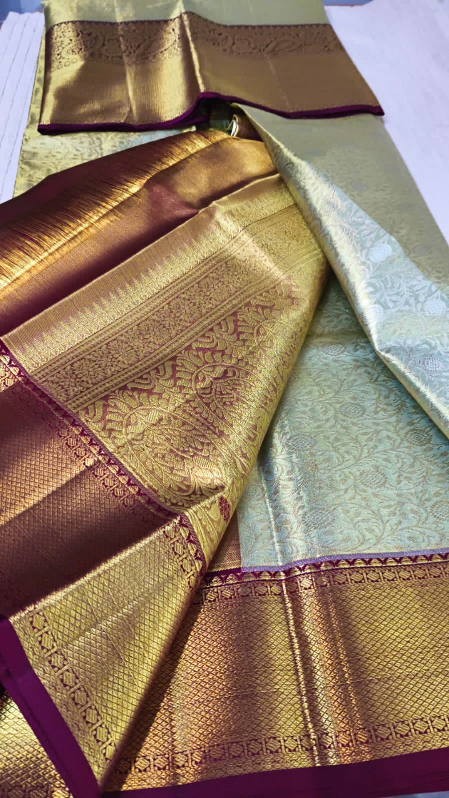 Handloom pure kanjivaram silk saree  bridal silk golden color with tissue all over pure golden jari all over green with maroon border 